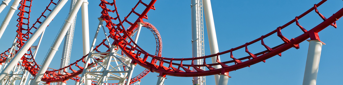 A roller coaster track of loops The scaring red loops of a roller coaster.